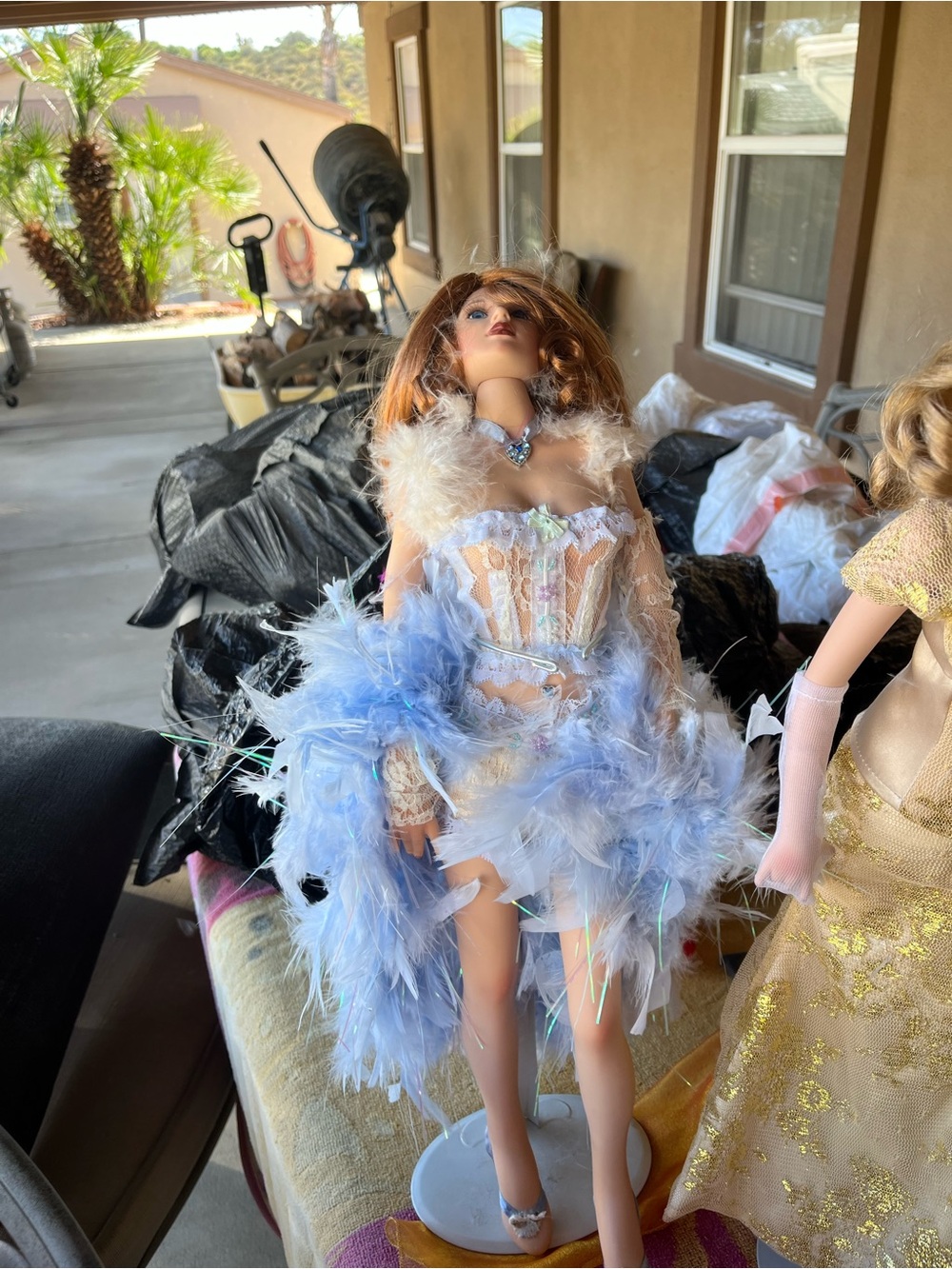 Blue Feathered Fashion Doll with Lace Corset